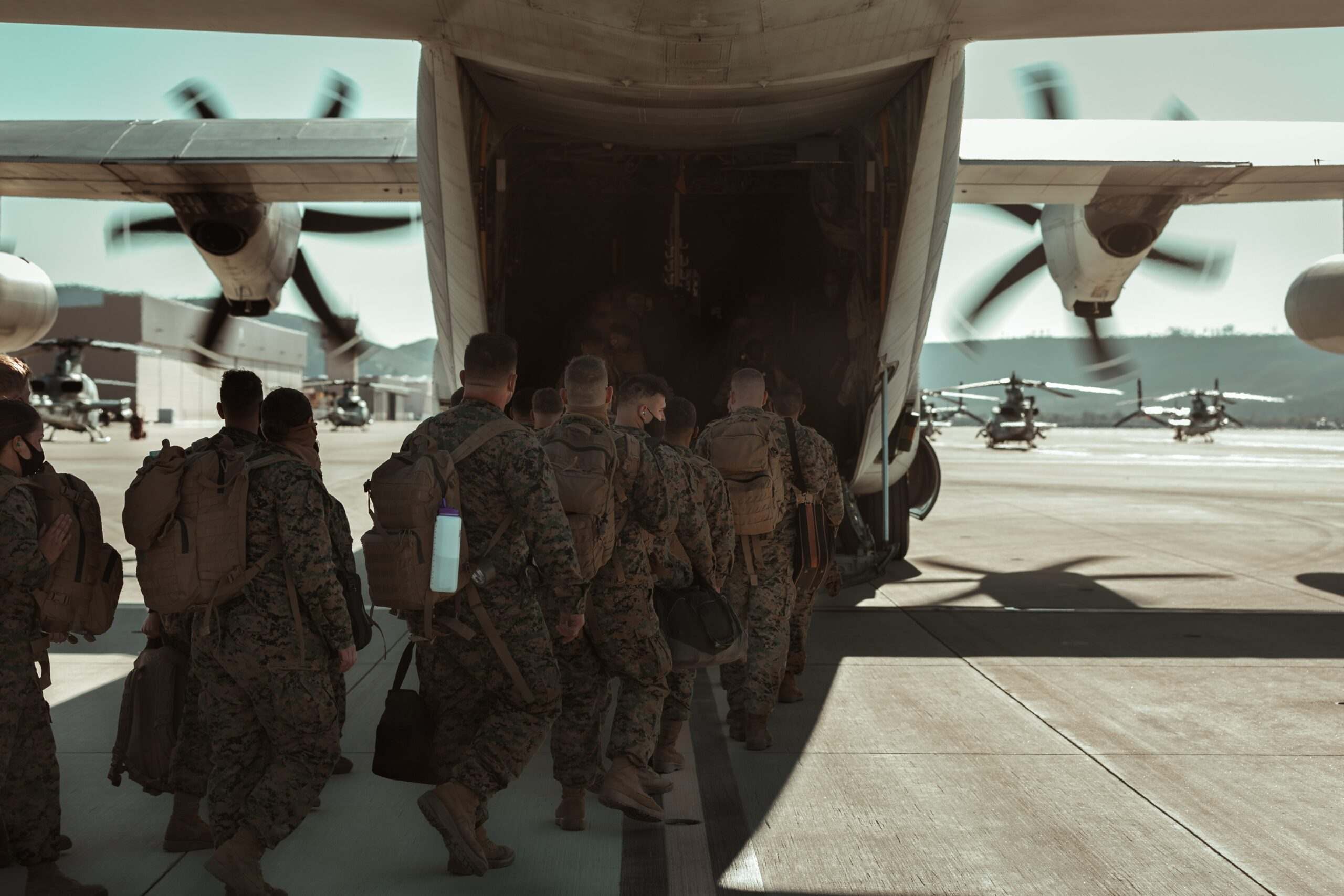 Troops aboard military aircraft